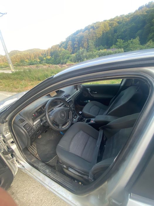 Vand sau schimb reno laguna cu e46