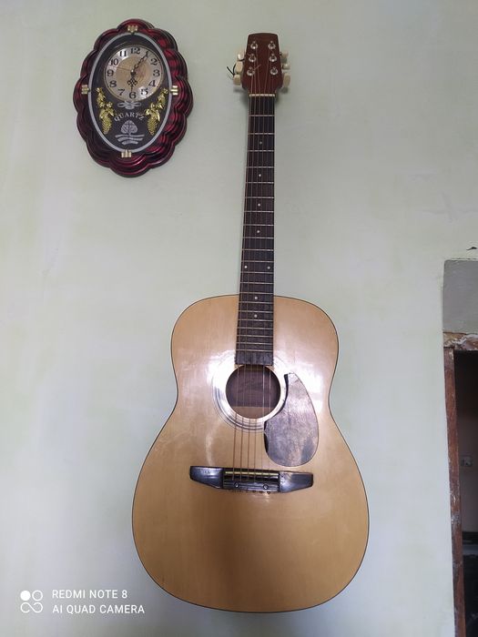 жагдайы зор .акустика гитар тары таза салынды.600000 мын келисемиз.тел