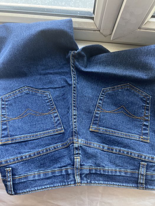 Джинсы новые