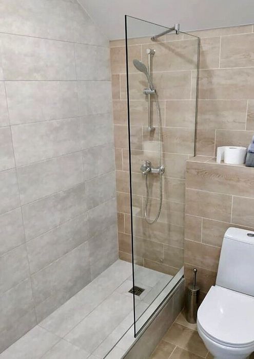 Стеклянные шторки для ванной