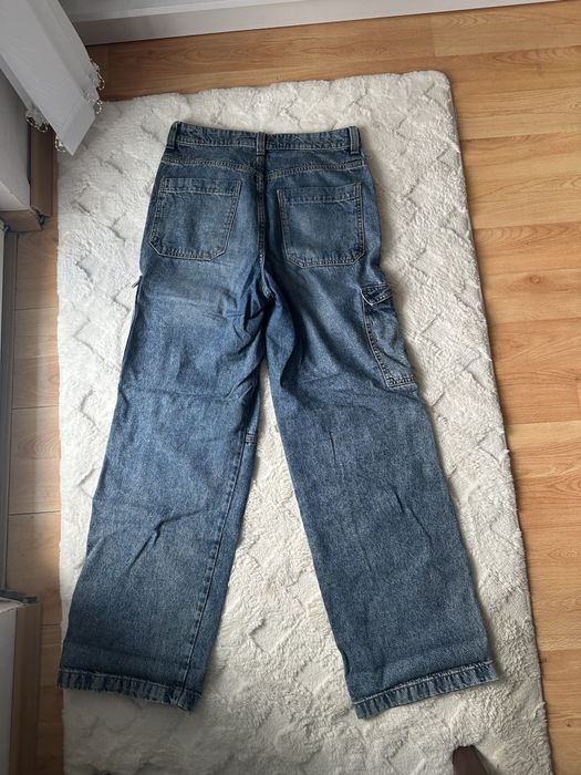 Сини дънки с джобове