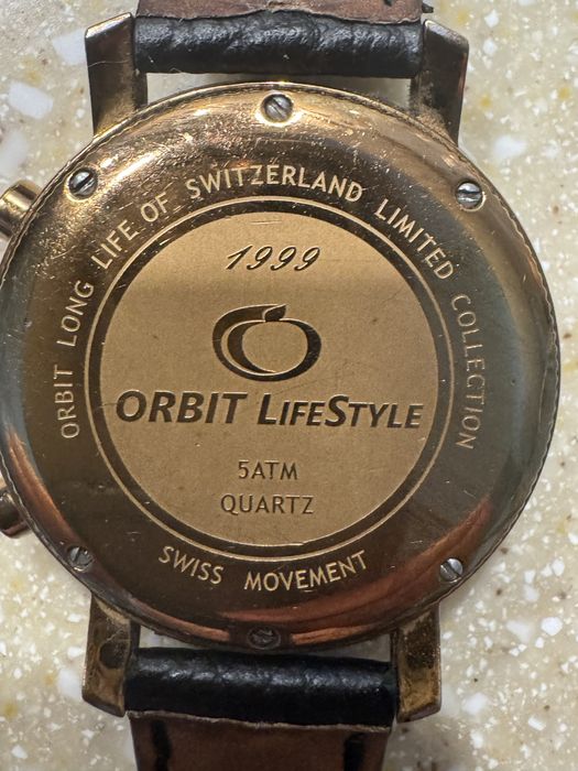 Швецарские золотые часы Orbit