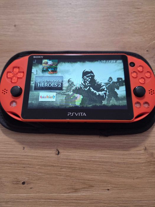 PS Vita Slim Red modat cu Sandisk Ultra 64gb impecabil cu folie