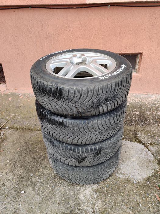 Set roți Ford ,anvelope iarnă+ jante aluminiu R15