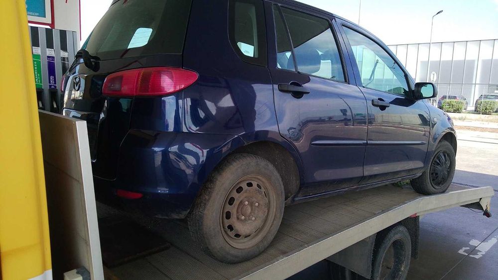 Мазда 2 на части ММ