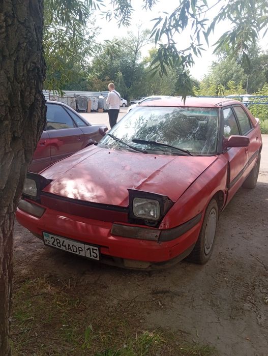 Продам Мазду 323