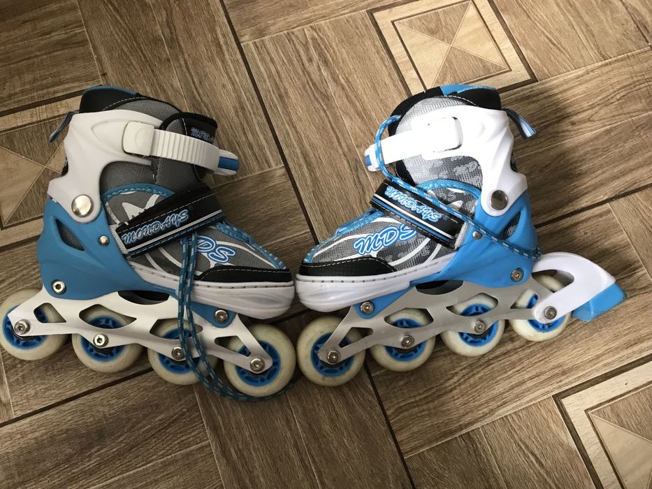 Роликовые коньки