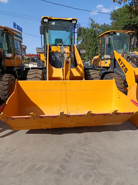 Фронтальный погрузчик frontalniy pagruzchik 9500 dan 27 mingacha