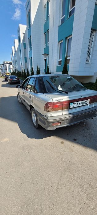 машина Mitsbishi Lancer