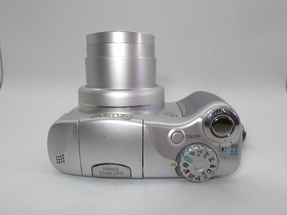 Canon PowerShot SX100 компактен цифров фотоапарат в сребърен цвят, дигитална камера в отлично състояние, 10х оптичен зум, 8MP, тестван работи супер