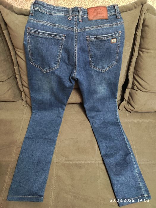 Продам синие джинсы