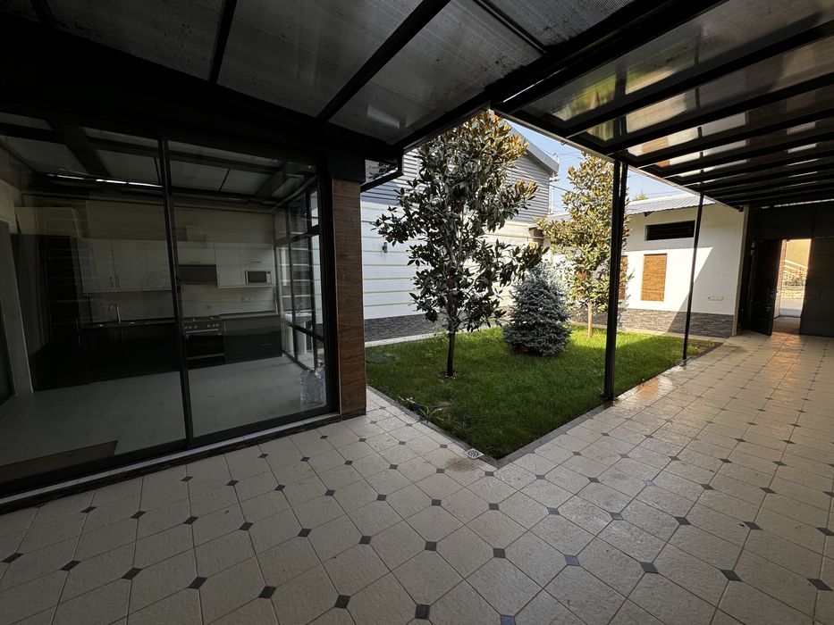 Дом в Центре на участке 3.2 сот по ул. Олтинтепа( бывш.Циалковского)