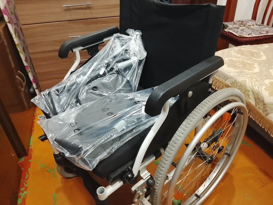 Инвалидную коляску