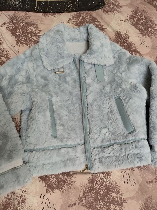 Продам меховую куртку