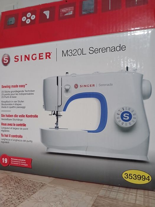 Masina de cust Singer M320L