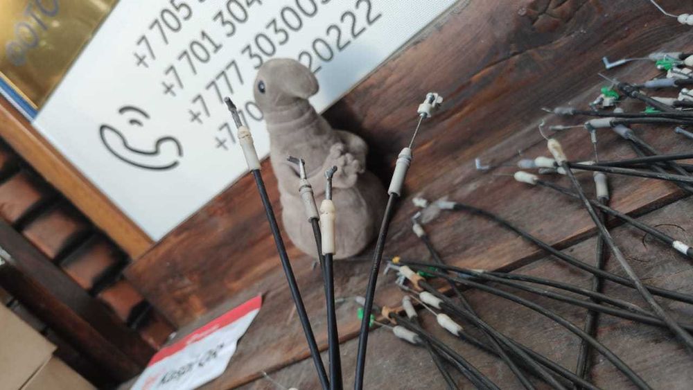 Тросик  двери RX300