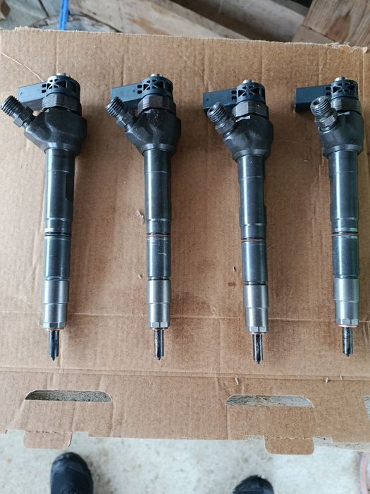 Injectoare Volkswagen Passat B7 20 tdi 2013 cod CFFB