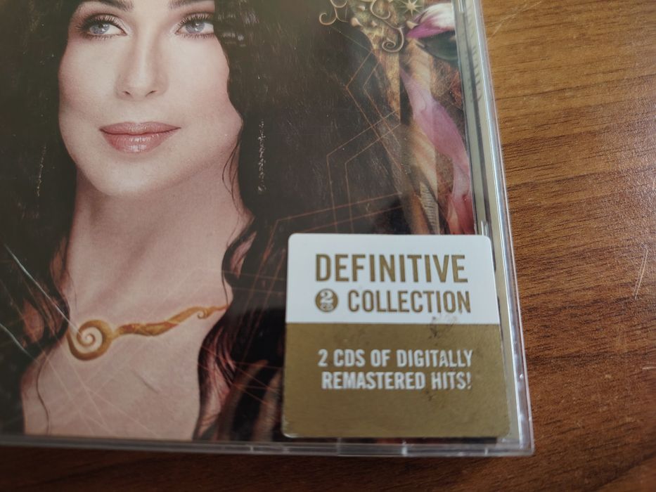 Три компакт диска на CHER