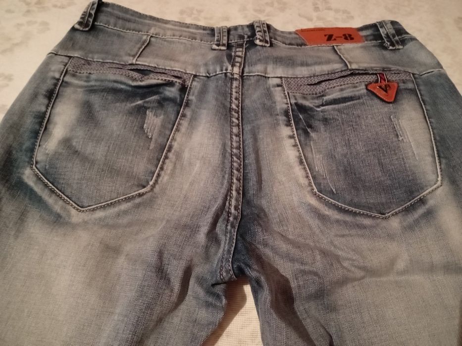 Продам женские джинсы 46