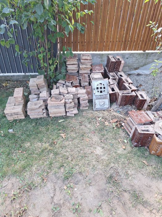 Soba de teracotă puțin folosită,  colturi, plăci și cărămizi