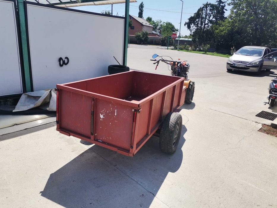 Motocultor O'MAC MC 12000E-D echipat cu remorca foarte incapatoare cu frana de picior