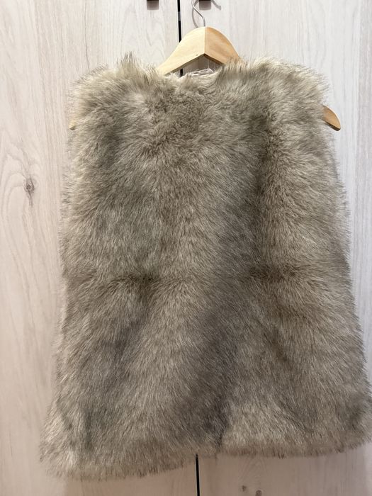 Vesta blana cu buzunare