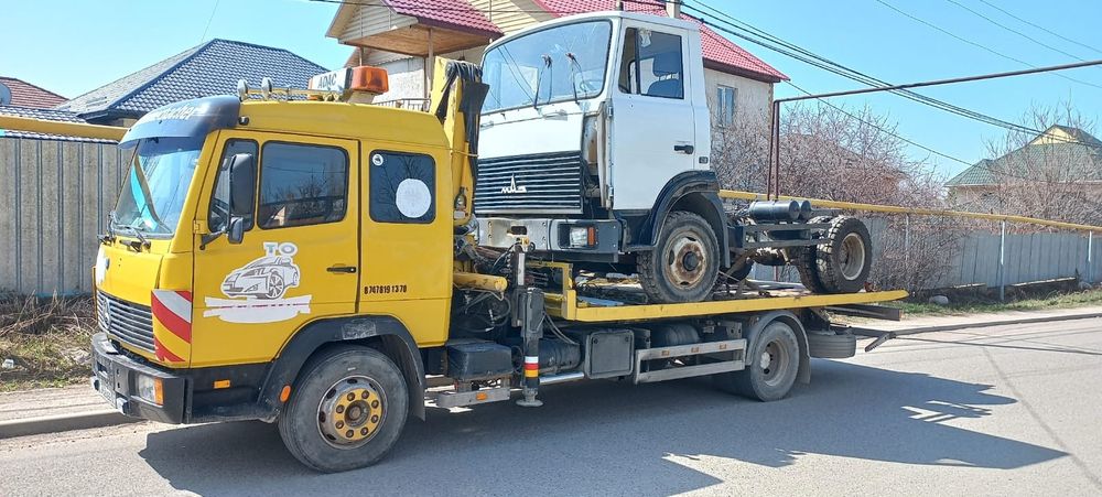 Грузовой эвакуатор манипулятор