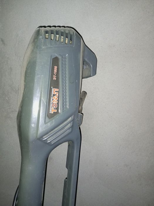 Триммер-газонокосилка для стрижки кустов и травы