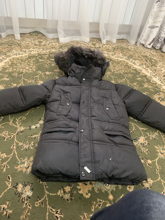 продается новый деский пуховик черного цвета