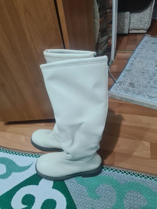 Продам новые зимние сапоги