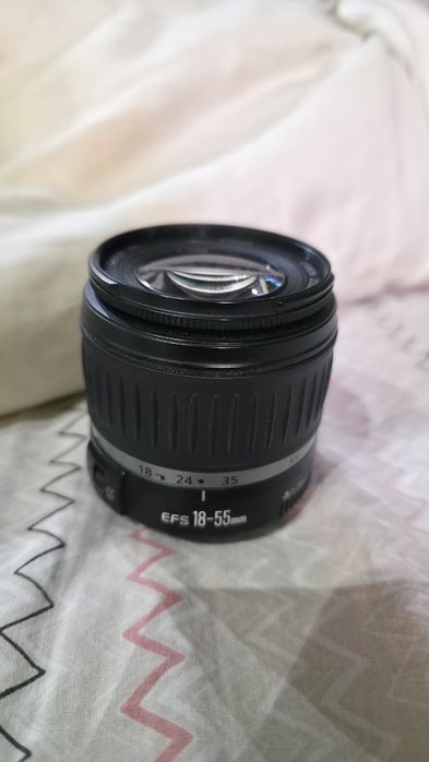 Объектив Canon вспышка Nikon