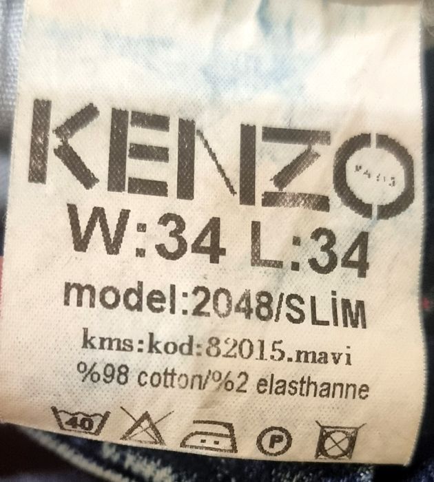 Джинсы рваные  Kenzo.