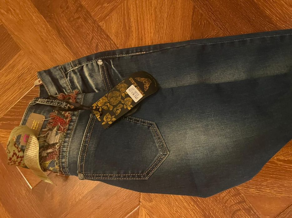 Продам женские джинсы