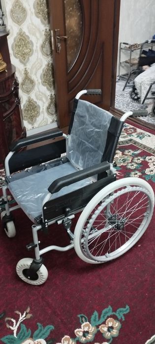 Nogironlar aravachasi yangi