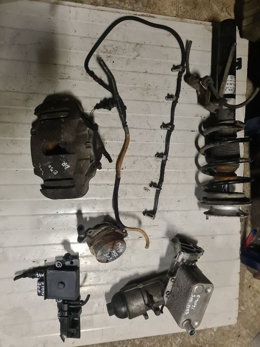 Rampa retur,pompă vacuum,telescop cu arc,etrier fata drepta bmw e90/91