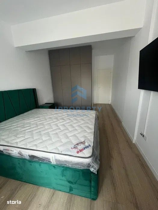 Neofort 50 Titan 2 camere cu balcon si parcare + prox. metrou