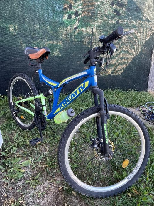 Bicicleta montbike dual suspensie ca si noua