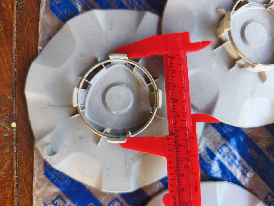 Set 4 capace centrale jante aliaj  Lancia (Delta,  Ypsilon)