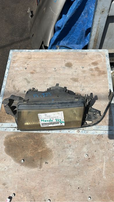 Левая фара на Mazda 323
