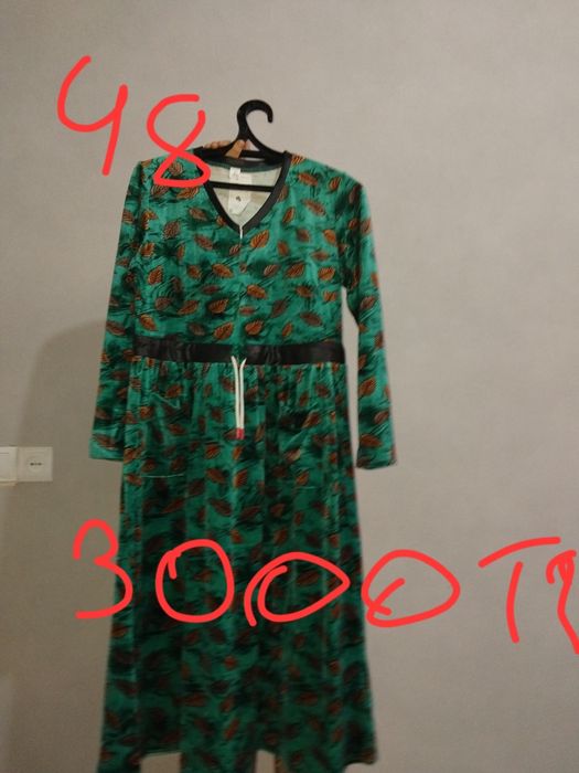 Нови көйлектер  текеткісі бар