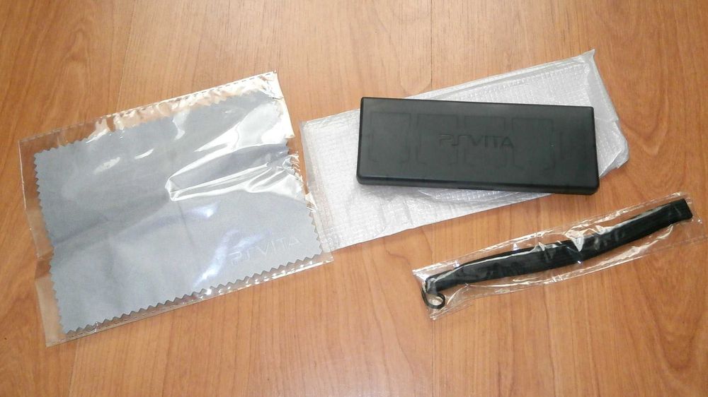 PS Vita -  pachet accesorii originale Sony + alte accesorii noi