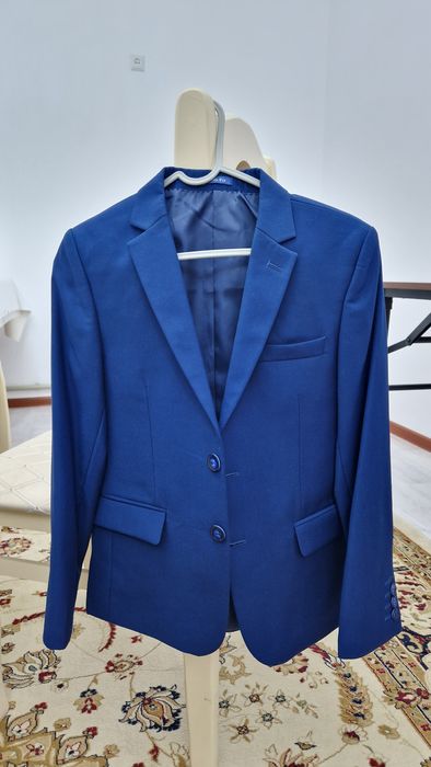 Костюмы,рубашки б/у