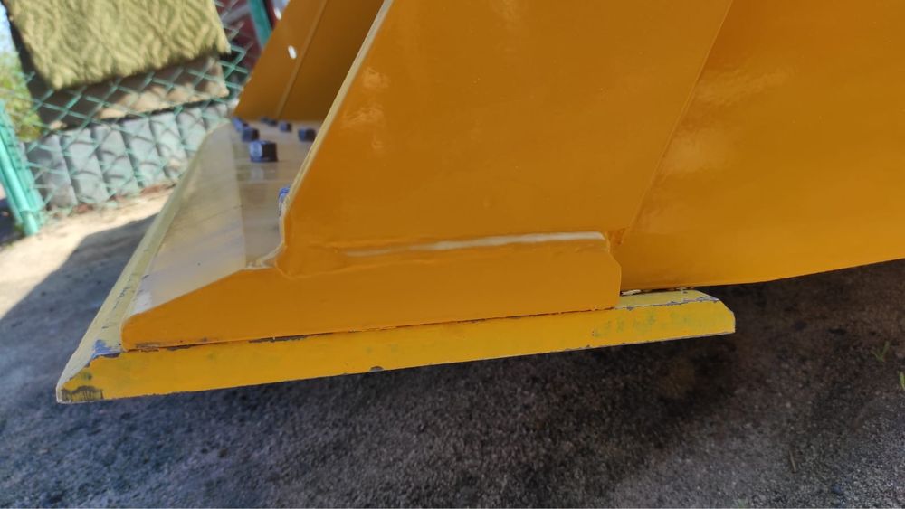 Защитный нож ковша