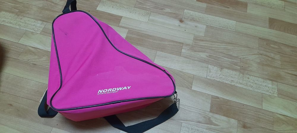 Роликовые коньки