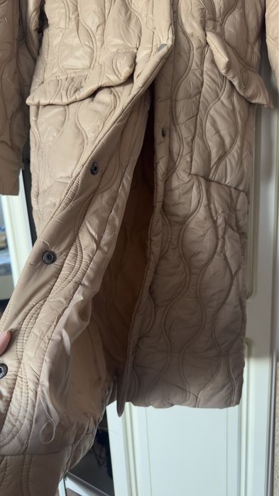 Новая куртка с этикеткой