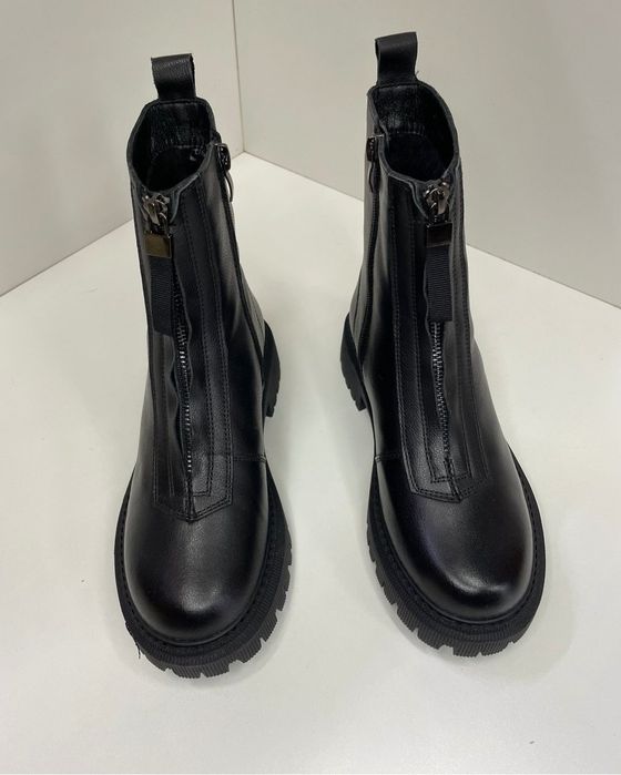 Продам новые зимние ботинки