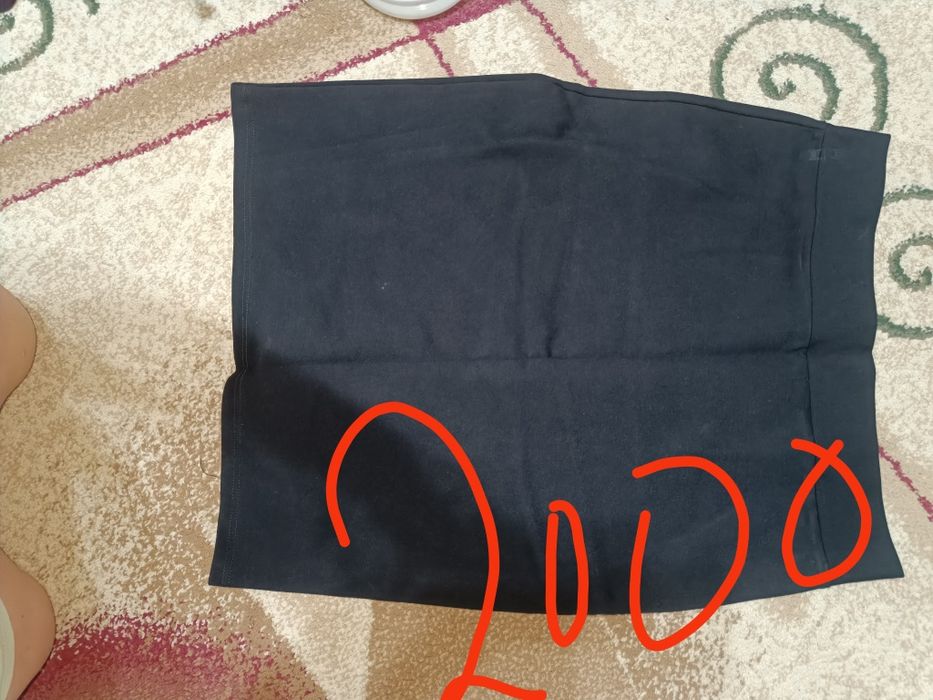 Продам костюмы и юбки