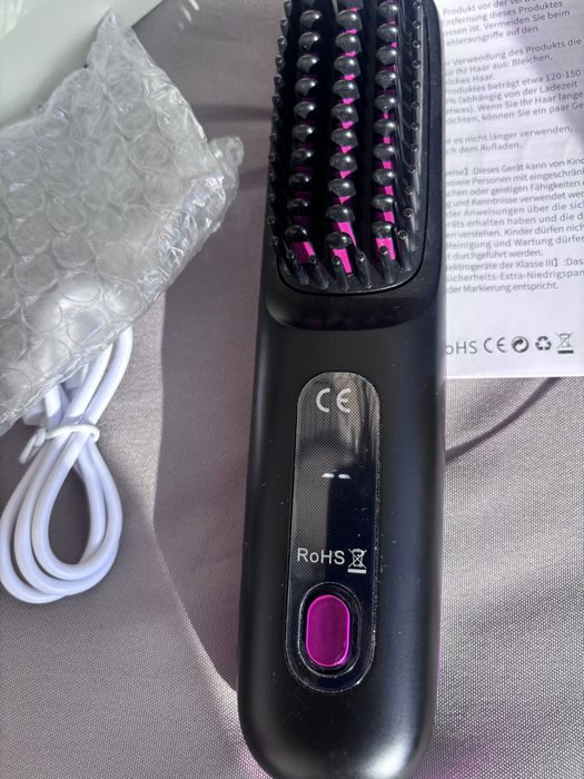 Perie electrica de indreptat parul
