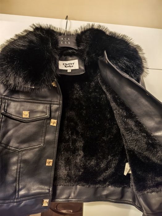 Дамско кожено яке от еко кожа и висококачествен еко пух. Яката се свал