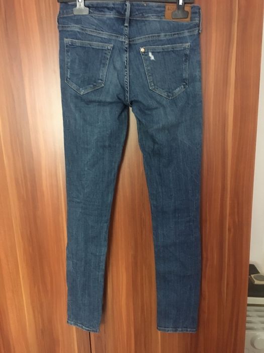 Blugi albastri skinny cu talie joasa